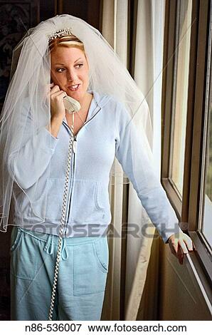 Bride on phone View Large Photo Image Stock Photo - Bride on phone. Fotosearch