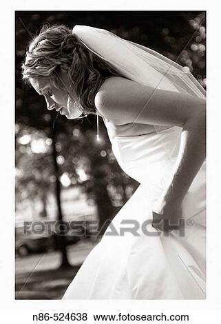 Bride walking with dress up View Large Photo Image Stock Photo - Bride walking with dress up. Fotosearch