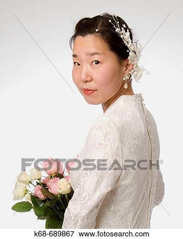 Bride with roses View Large Photo Image Stock Photo - Bride with roses. Fotosearch