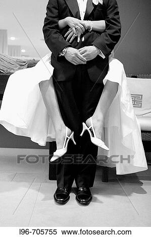 brides body fully embracing her groom after the wedding View Large Photo Image Stock Photography - brides body fully embracing her groom after the wedding. Fotosearch
