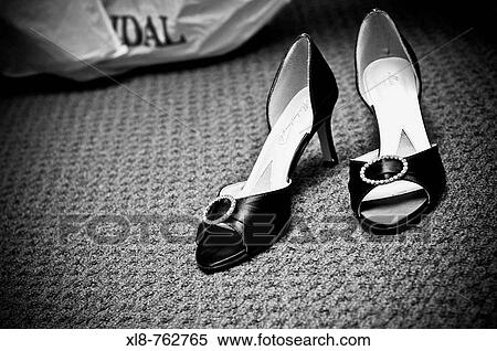 Stock Photography - Bride's wedding shoes. Fotosearch