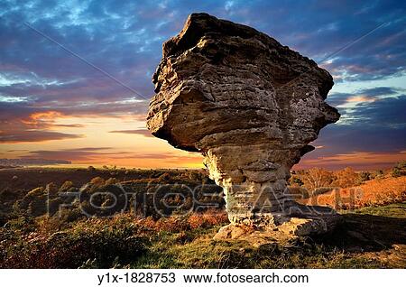 Bridestone rock formation in Dalby forest Formed by softer sndstone being eroded faster that the limestone that is above it North Yorks Moors National Park View Large Photo Image Stock Image - Bridestone rock formation in Dalby forest Formed by softer sndstone being eroded faster that the limestone that is above it North Yorks Moors National Park. Fotosearch