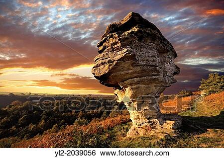 Bridestone rock formation in Dalby forest. Formed by softer sndstone being eroded faster that the limestone that is above it. North Yorks Moors National Park. View Large Photo Image Stock Photograph - Bridestone rock formation in Dalby forest. Formed by softer sndstone being eroded faster that the limestone that is above it. North Yorks Moors National Park.. Fotosearch