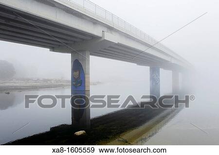 bridge in the fog on valmayor dam View Large Photo Image Stock Photo - bridge in the fog on valmayor dam. Fotosearch