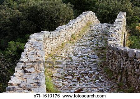 Bridge over Llierca River - 14th Century -, between Sadernes and Montagut villages, La Garrotxa, Girona, Spain View Large Photo Image Stock Photograph - Bridge over Llierca River - 14th Century -, between Sadernes and Montagut villages, La Garrotxa, Girona, Spain. Fotosearch
