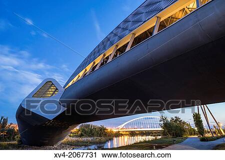 Bridge Pavilion designed by Zaha Hadid, in the night, Saragoza, Aragon, Spain. View Large Photo Image Stock Image - Bridge Pavilion designed by Zaha Hadid, in the night, Saragoza, Aragon, Spain.. Fotosearch