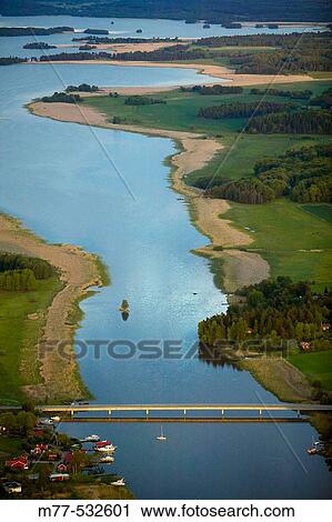 Bridge, village and small harbour, aerial view. Lake M? laren, Eskilstuna, Sodermanland, Sweden View Large Photo Image Stock Image - Bridge, village and small harbour, aerial view. Lake M? laren, Eskilstuna, Sodermanland, Sweden. Fotosearch