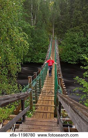 Stock Image - Brigde, Oulankajoki river, Oulanka Canyon day trail, National Park of Oulanka, Kuusamo, Finland. Fotosearch