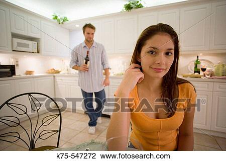 Stock Image - bringing her some wine. Fotosearch