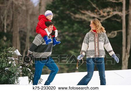 Bringing home the Christmas tree View Large Photo Image Stock Image - Bringing home the Christmas tree. Fotosearch