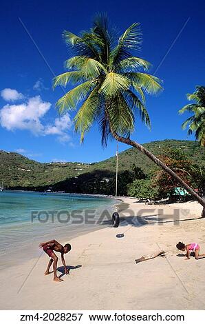 BRITISH VIRGIN IS.,TORTOLA IS., CANE GARDEN BAY, BEACH, LOCAL CHILDREN. View Large Photo Image Stock Photo - BRITISH VIRGIN IS.,TORTOLA IS., CANE GARDEN BAY, BEACH, LOCAL CHILDREN.. Fotosearch
