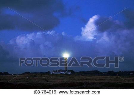 Brittany, Belle-Ile: large lighthouse under the cloudy sky View Large Photo Image Stock Photo - Brittany, Belle-Ile: large lighthouse under the cloudy sky. Fotosearch