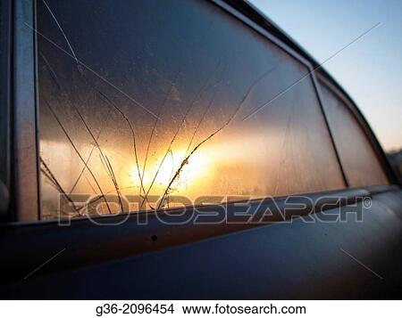 Picture - Broken glass window of a car, San Luis Obispo, California, United States.. Fotosearch