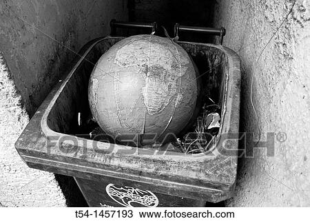 Broken globe is in a dumpster View Large Photo Image Stock Image - Broken globe is in a dumpster. Fotosearch