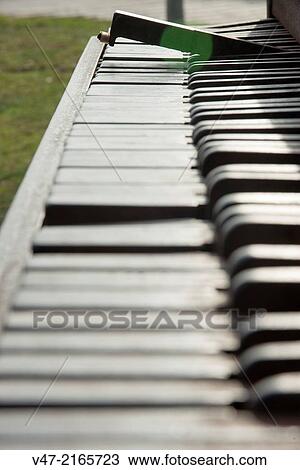 Stock Image - Broken piano keys. Fotosearch