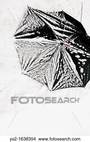 Broken umbrella in snow View Large Photo Image Picture - Broken umbrella in snow. Fotosearch