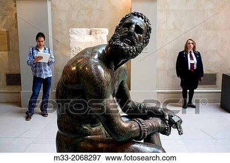 Stock Photo - Bronze Boxer of Quirinal, aka the Terme Boxer, Hellenistic Greek sculpture in the Metropolitan Museum, New York, USA. Fotosearch