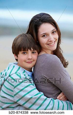 Brother and sister (12 and 20 year old) View Large Photo Image Stock Photo - Brother and sister (12 and 20 year old). Fotosearch