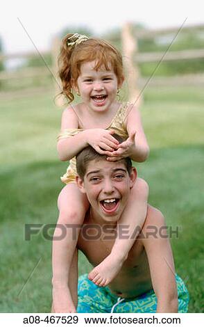 Brother and sister clown around View Large Photo Image Stock Photo - Brother and sister clown around. Fotosearch