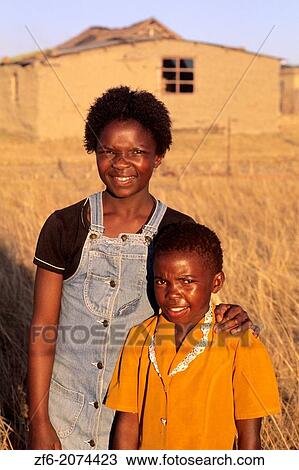 Stock Image - Brother and Sister Near Durban in South Africa.. Fotosearch