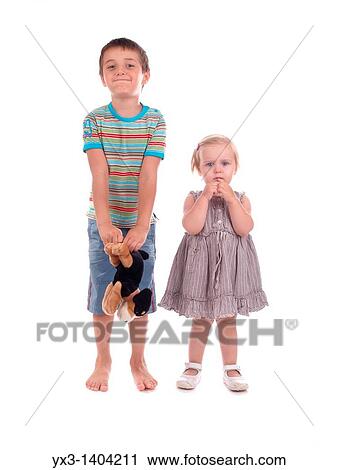 Stock Image - Brother and sister studio portrait on white. Fotosearch