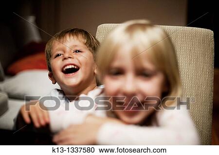 Brother laughing View Large Photo Image Stock Image - Brother laughing. Fotosearch