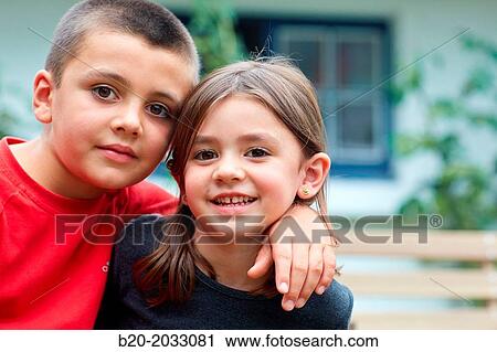 Stock Image - Brothers of 5 and 8 years. Donostia. San Sebastian. Gipuzkoa. Basque Country. Spain.. Fotosearch