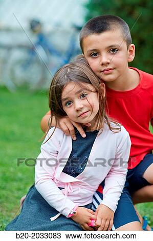 Stock Image - Brothers of 5 and 8 years. Donostia. San Sebastian. Gipuzkoa. Basque Country. Spain.. Fotosearch