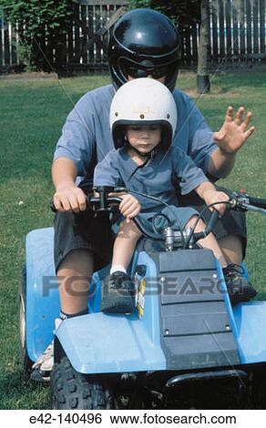 Brothers on quad View Large Photo Image Stock Photograph - Brothers on quad. Fotosearch