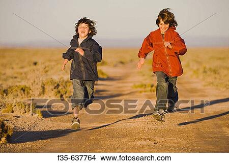 Brothers Run on Baja California Road View Large Photo Image Picture - Brothers Run on Baja California Road. Fotosearch
