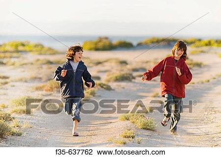 Brothers Run on Baja California Road View Large Photo Image Stock Image - Brothers Run on Baja California Road. Fotosearch