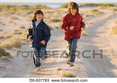 Brothers Run on Baja California Road View Large Photo Image Stock Image - Brothers Run on Baja California Road. Fotosearch