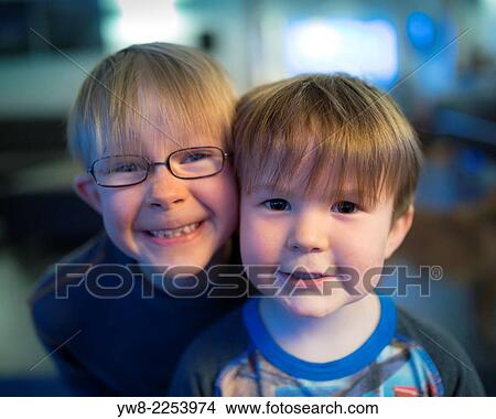 Picture - Brothers smiling for the camera, Iceland.. Fotosearch