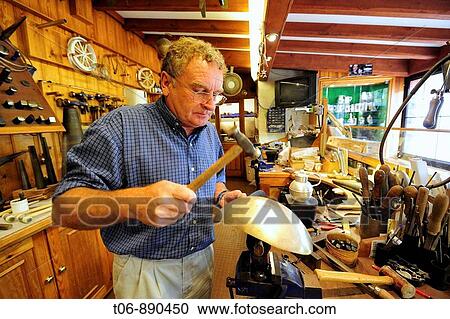 Stock Image - Bruce Russel, Gold, Silversmith and Jeweller since four generations in St Saviours Guernsey, Channel Islands, UK. Fotosearch