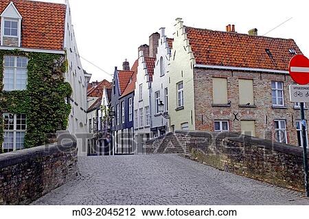 Bruges Belgium Flanders Europe Brugge tree lined canals with stone bridges and guild houses. View Large Photo Image Stock Image - Bruges Belgium Flanders Europe Brugge tree lined canals with stone bridges and guild houses.. Fotosearch