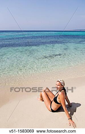 Brunette beautiful woman at the beach in Formentera View Large Photo Image Stock Photo - Brunette beautiful woman at the beach in Formentera. Fotosearch