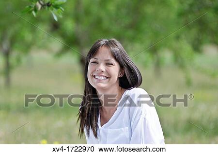 Brunette breathing fresh air in the ruralscape View Large Photo Image Stock Image - Brunette breathing fresh air in the ruralscape. Fotosearch