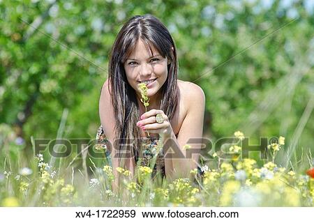Brunette breathing fresh air in the ruralscape View Large Photo Image Stock Photo - Brunette breathing fresh air in the ruralscape. Fotosearch