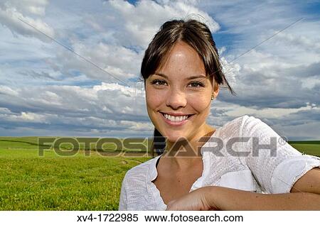 Brunette breathing fresh air in the ruralscape View Large Photo Image Stock Photography - Brunette breathing fresh air in the ruralscape. Fotosearch
