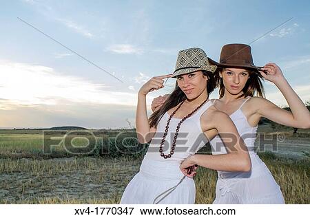 Brunette couple dancing and walk in the countryside View Large Photo Image Stock Photo - Brunette couple dancing and walk in the countryside. Fotosearch