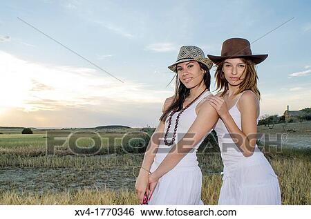 Brunette couple dancing and walk in the countryside View Large Photo Image Stock Photograph - Brunette couple dancing and walk in the countryside. Fotosearch