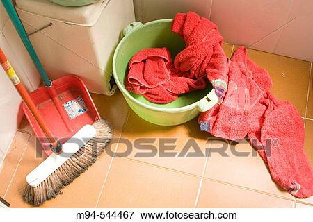 Stock Photo - Brush, dustpan and towels. Fotosearch