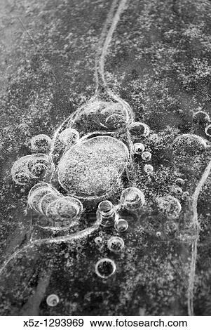 Bubbles frozen in ice View Large Photo Image Stock Photo - Bubbles frozen in ice. Fotosearch