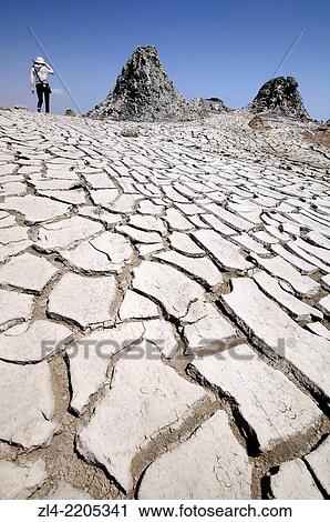 Bubbling mud volcano. Azerbaijan, Qobustan. Model Released. View Large Photo Image Stock Image - Bubbling mud volcano. Azerbaijan, Qobustan. Model Released.. Fotosearch