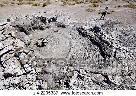 Bubbling mud volcano. Azerbaijan, Qobustan. Model Released. View Large Photo Image Stock Photo - Bubbling mud volcano. Azerbaijan, Qobustan. Model Released.. Fotosearch