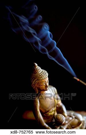 Buddha little statue with incense sticks View Large Photo Image Stock Photography - Buddha little statue with incense sticks. Fotosearch