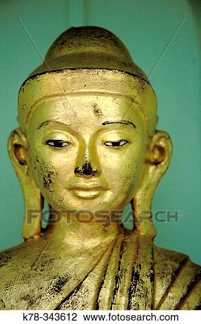 Buddha statue at the Shwedagon Paya, the most sacred Buddhist Temple complex in Myanmar. Yangoon (Rangoon), Myanmar View Large Photo Image Stock Image - Buddha statue at the Shwedagon Paya, the most sacred Buddhist Temple complex in Myanmar. Yangoon (Rangoon), Myanmar. Fotosearch