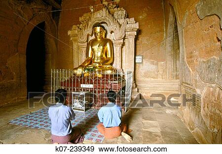 Stock Photo - Buddha statue inside Htilominio Pagoda. Bagan Archaeological site. Mandalay division. Myanmar (Burma). Fotosearch