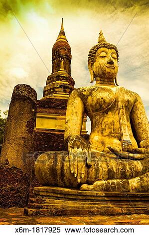 Stock Photography - Buddha statue Sukhothai Historical Park Thailand. Fotosearch
