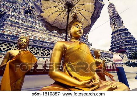Buddha statue Wat Arun Rajwararam or Temple of the Dawn Bangkok, Thailand View Large Photo Image Stock Photo - Buddha statue Wat Arun Rajwararam or Temple of the Dawn Bangkok, Thailand. Fotosearch